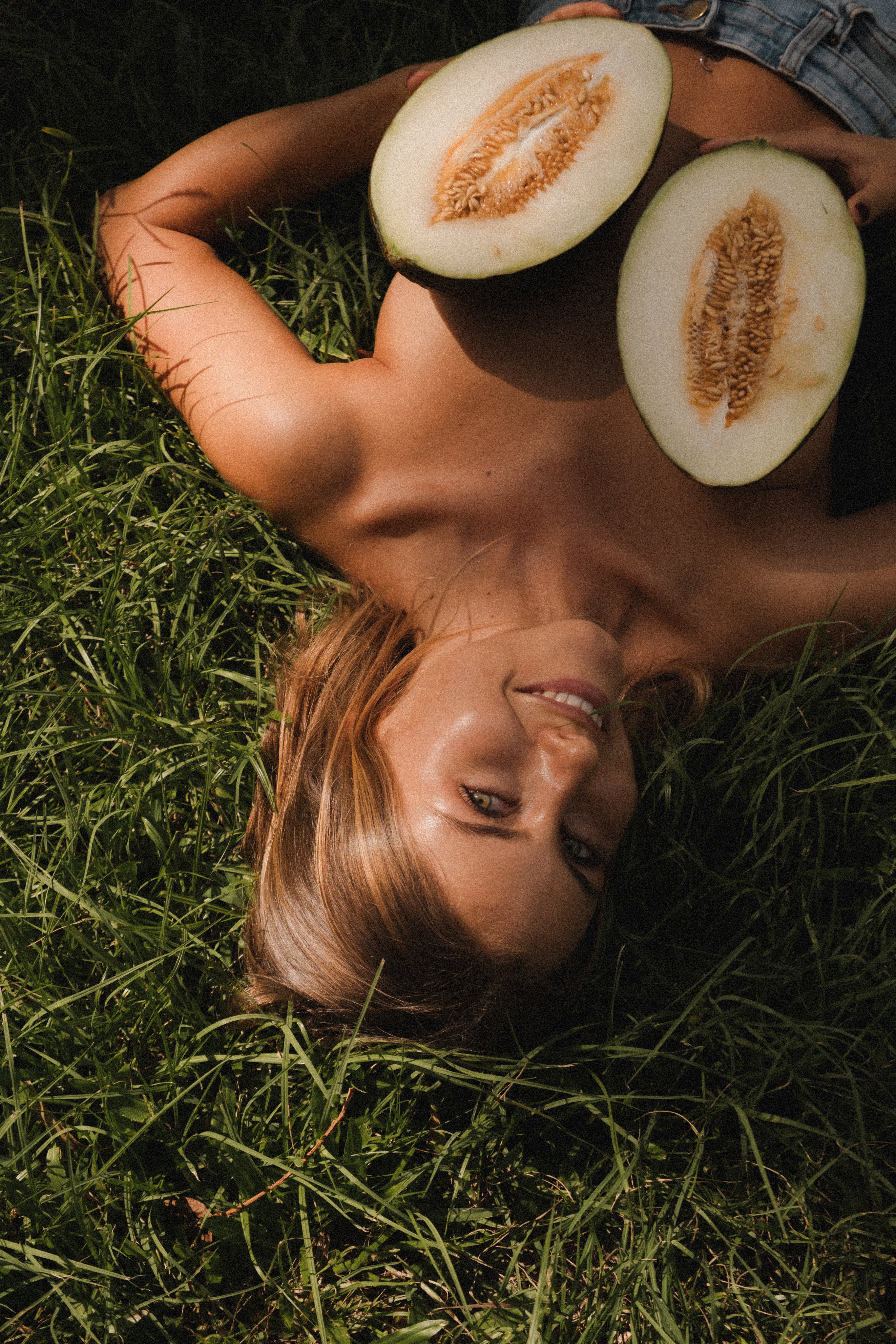A woman glowing with natural, whole-food beauty